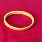 Gold plated textured classic bangle for women