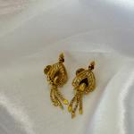Gold plated heart shaped filigree design earring with redstone